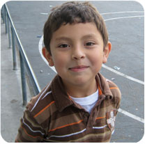 Young boy in brown shirt